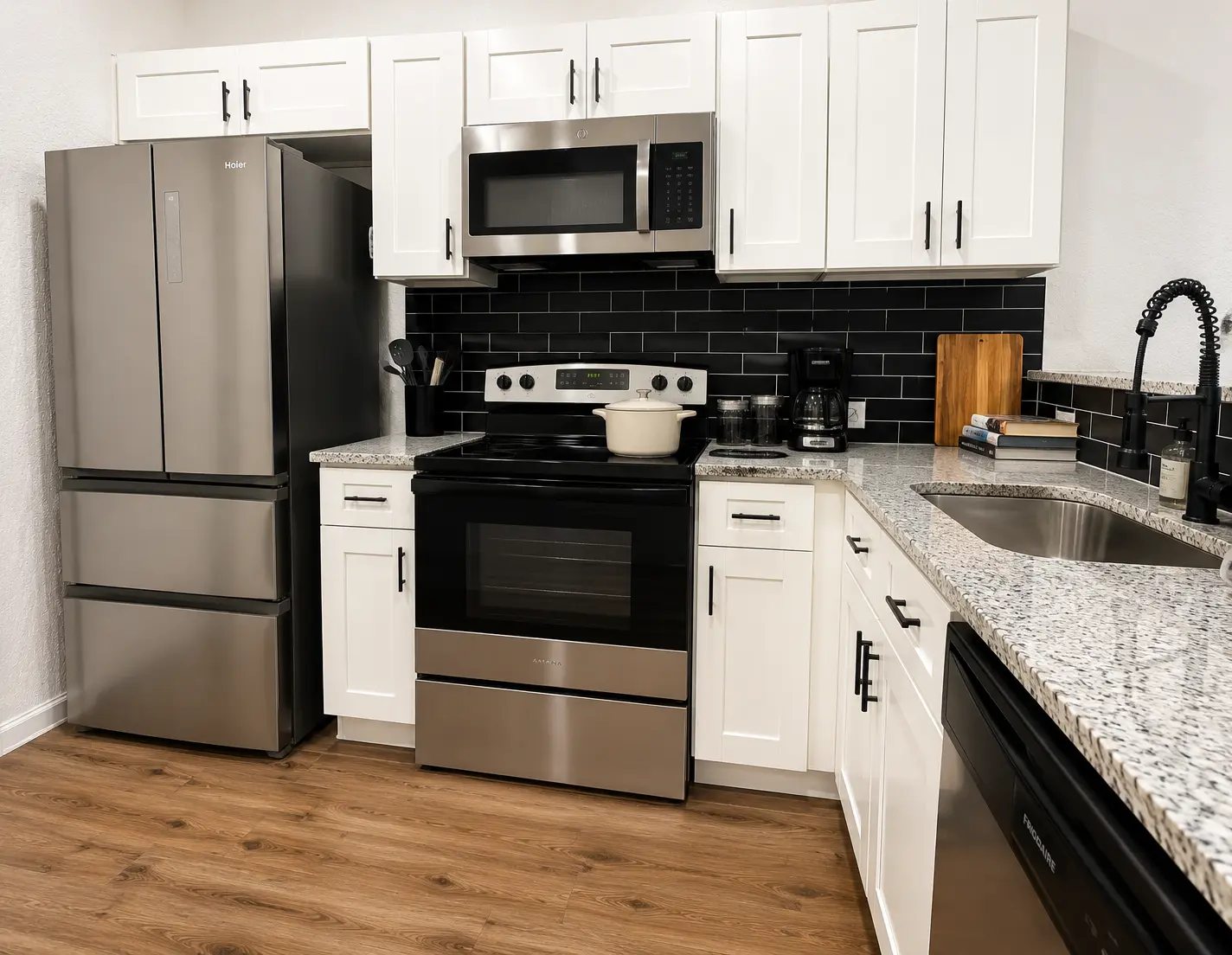 Full kitchen with stainless steel appliances
