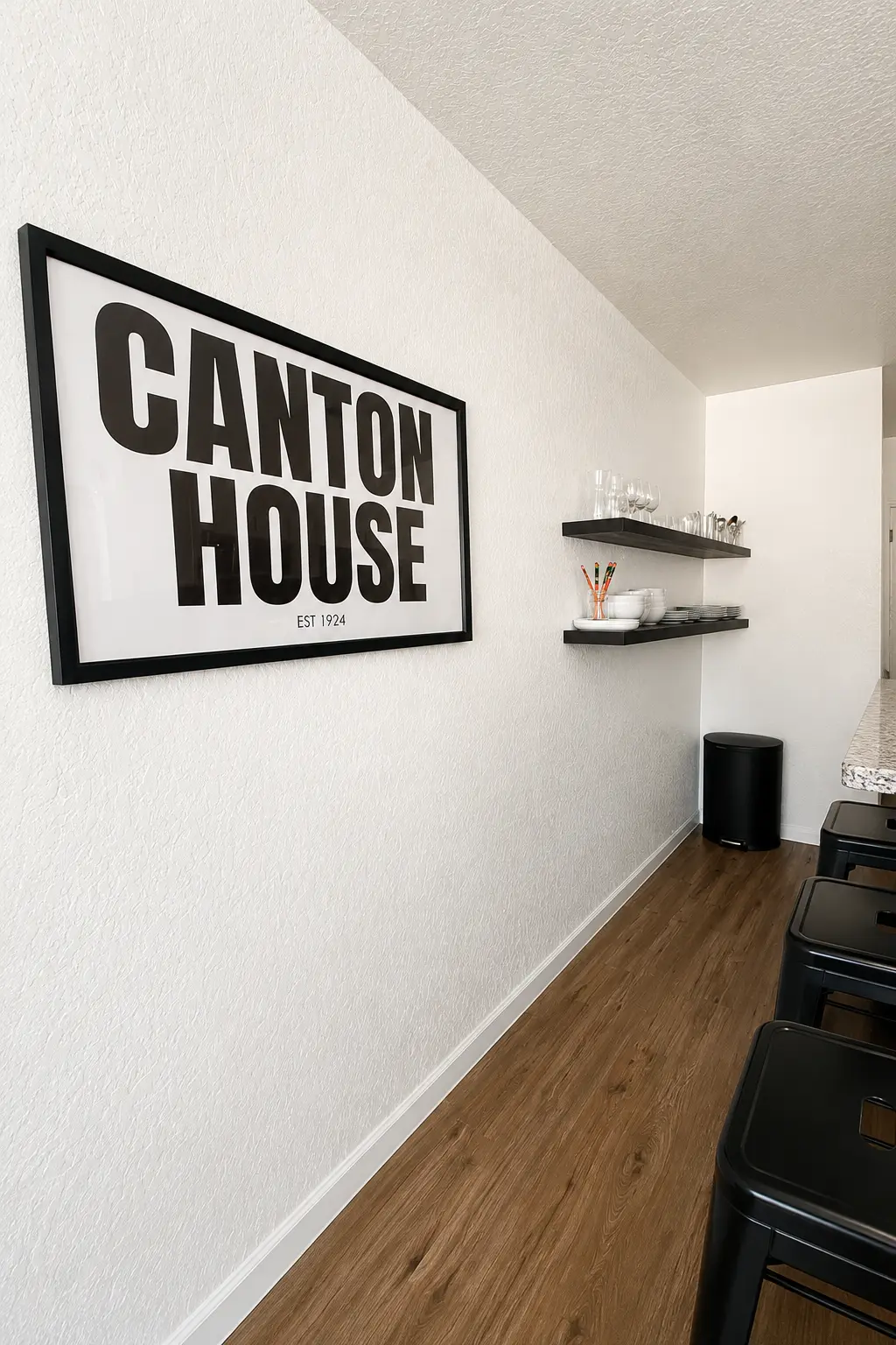 Canton House wall sign beside the kitchen
